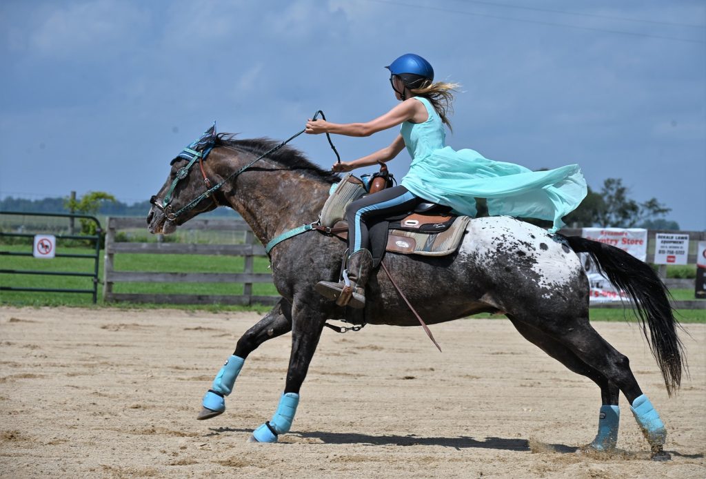 Barrel racing at a Circle K-D show